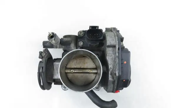 Volkswagen Golf IV Throttle body valve 06A133064J