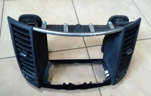 Dash center air vent grill