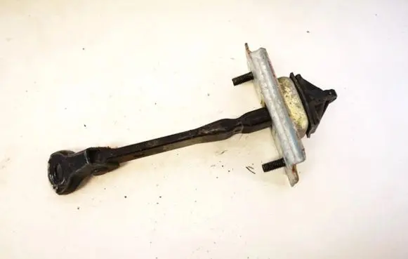 Front door check strap stopper