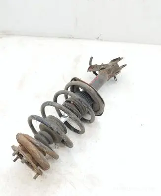 Nissan Almera N16 Front shock absorber with coil spring