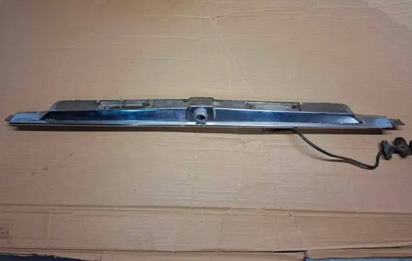 Mercedes-Benz 280 450 W116 Trunk door license plate light bar 1166900580