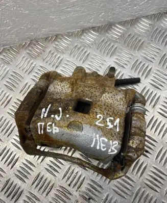 Nissan Juke I F15 Front brake caliper