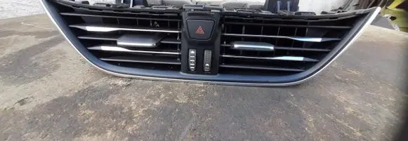 Dash center air vent grill