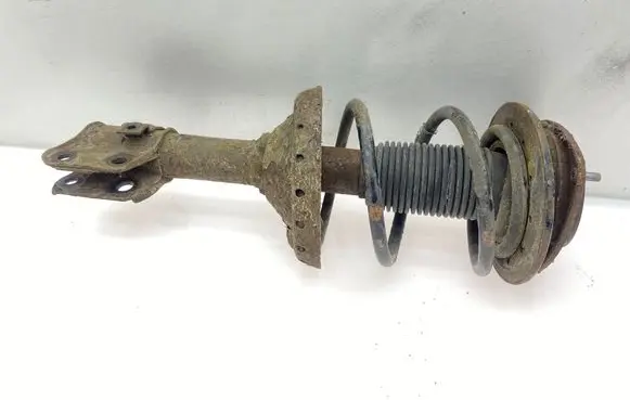 Subaru Legacy Front shock absorber with coil spring