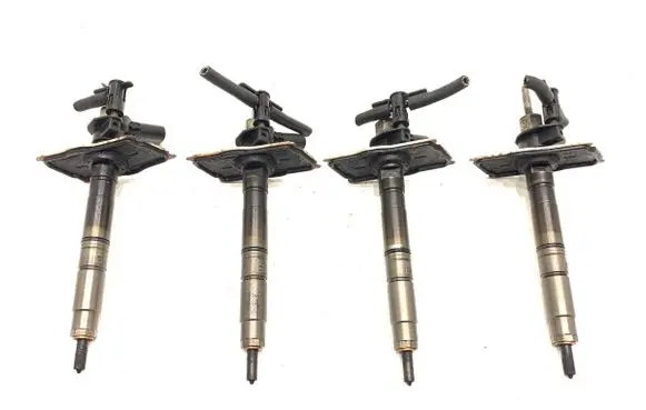 Volkswagen PASSAT B6 Fuel injectors set 03L130277
