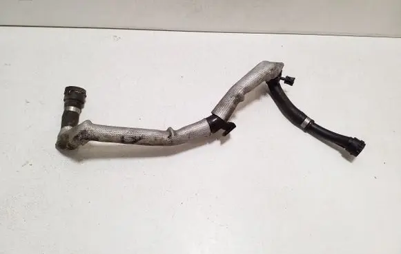 Volkswagen Touareg II Engine coolant pipe/hose 7P6122109