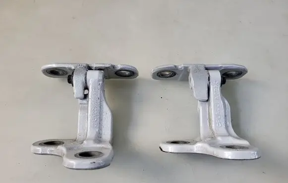Jaguar XF X260 Front door lower hinge CPLA228A65AD CPLA228A67AC