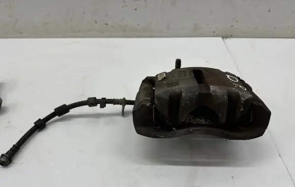 Opel Insignia B Front brake caliper 84124404