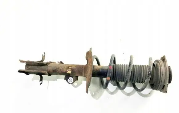 Nissan Juke I F15 Front shock absorber with coil spring