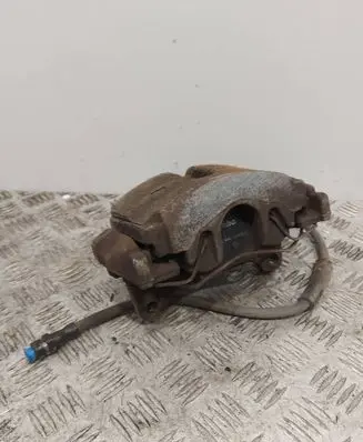 Volkswagen PASSAT B7 Front brake caliper 