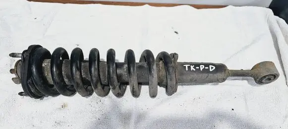 Toyota Land Cruiser (J150) Front shock absorber with coil spring