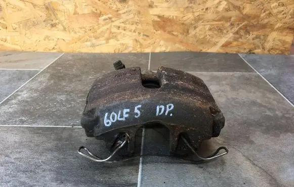 Volkswagen Golf V Front brake caliper 582