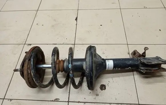 Mitsubishi Outlander Front shock absorber with coil spring