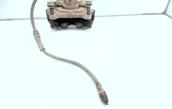 Volkswagen PASSAT B7 Front brake caliper 