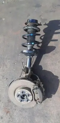 Subaru Forester SJ Front shock absorber with coil spring 