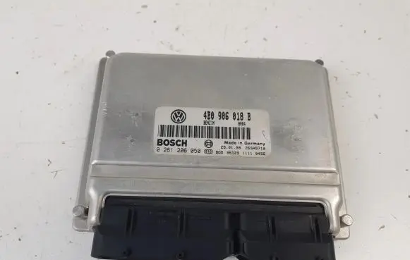 Volkswagen PASSAT B5 Engine control unit/module 4B0906018B