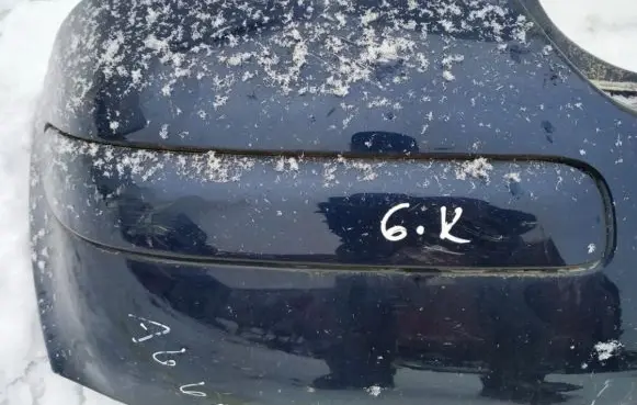 Rear bumper trim bar molding