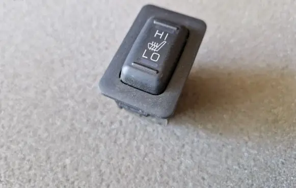 Mitsubishi L200 Seat heating switch 8610A076