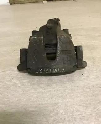 Mazda 3 II Front brake caliper