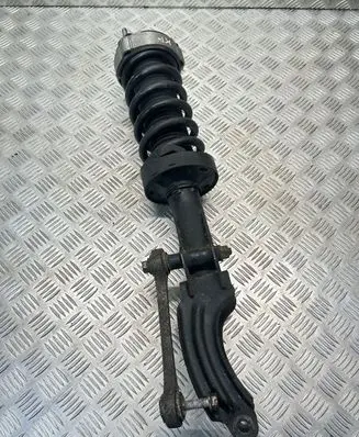 Volkswagen Touareg II Front shock absorber with coil spring 7P0412295C