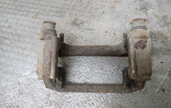 Mazda CX-7 Brake caliper pad carrier rear 