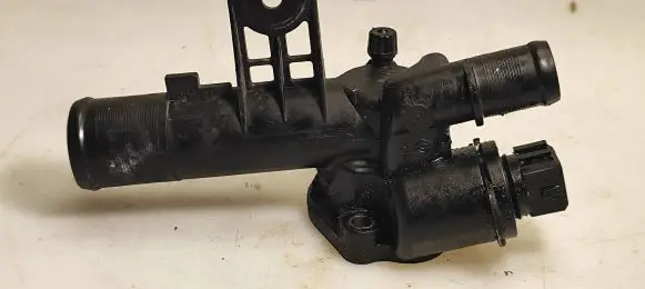Thermostat/thermostat housing