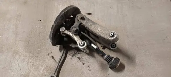 Rear wheel hub spindle/knuckle