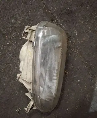 Volkswagen Golf III Headlight/headlamp 21950403