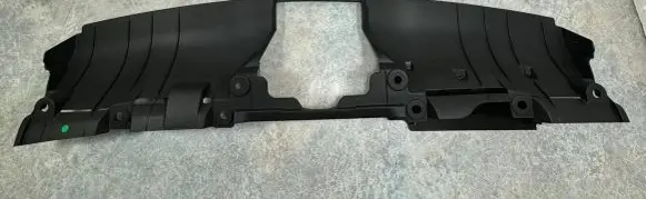 Engine bonnet/hood lock trim molding