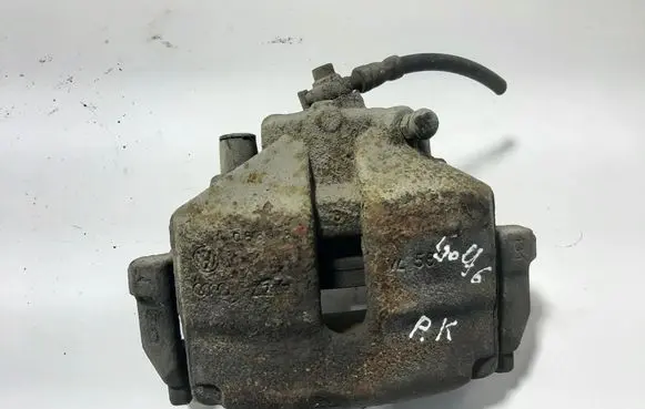 Volkswagen Golf VI Front brake caliper 