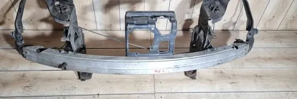 Radiator support slam panel bracket