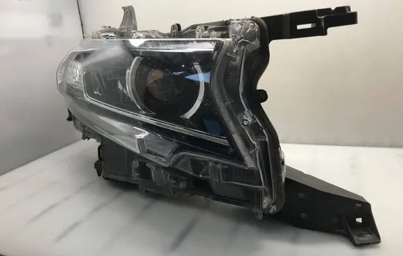 Toyota Land Cruiser (J150) Headlight/headlamp 8114560N20