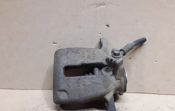 Volkswagen PASSAT B7 Rear brake caliper