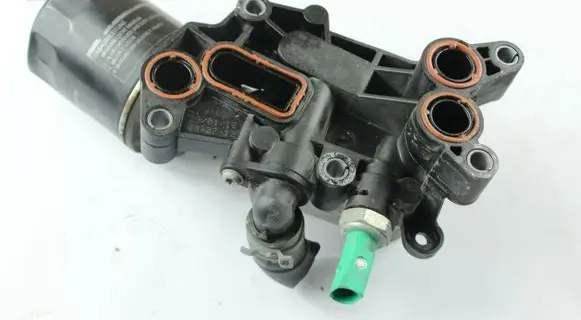 Skoda Fabia Mk3 (NJ) Oil filter mounting bracket 04B115389B 03L117021C