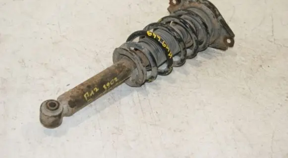 Nissan Primera Rear shock absorber/damper 56210AV725