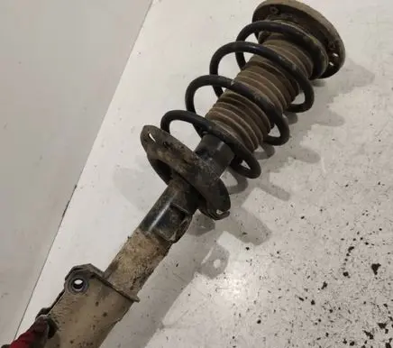 Fiat Croma Front shock absorber with coil spring 50708591