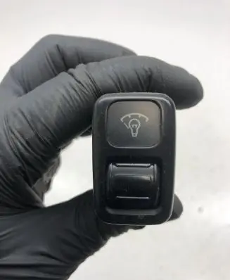 Panel lighting control switch