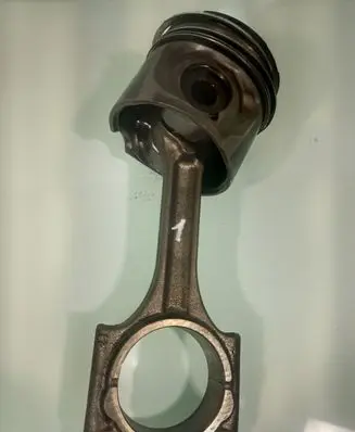 Piston with connecting rod