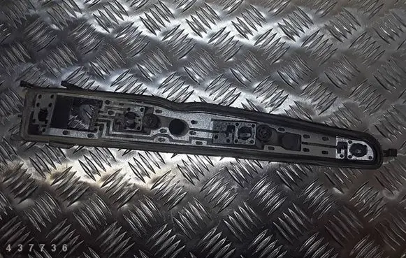 Tail light bulb cover holder