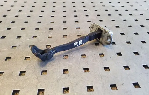 Nissan X-Trail T31 Front door check strap stopper