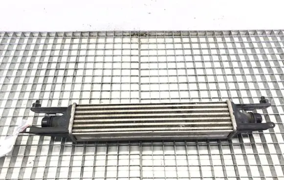 Opel Corsa D Intercooler radiator 55702194