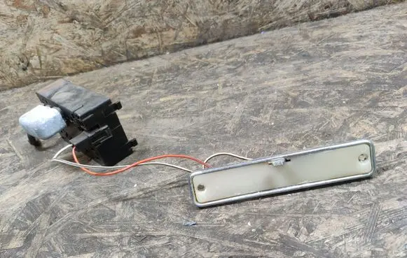 Panel lighting control switch