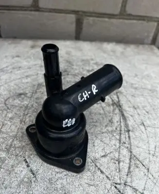 Thermostat/thermostat housing