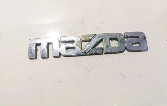 Mazda 626 Manufacturer badge logo/emblem 