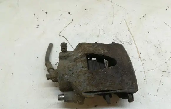 Volkswagen Golf V Front brake caliper