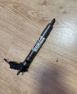 Volkswagen PASSAT B6 Fuel injector 03L130277 0445116