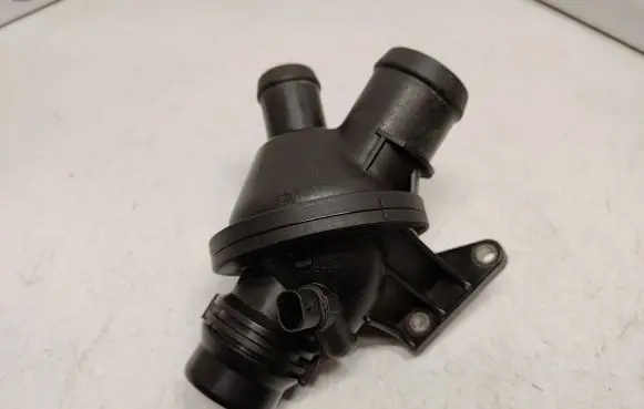 Thermostat/thermostat housing