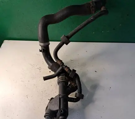 Skoda Superb B6 (3T) Engine coolant pipe/hose 03L121132Q