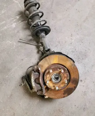 Front wheel hub spindle knuckle