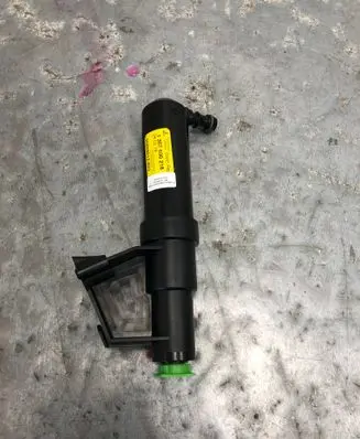 Volvo V50 Headlight washer spray nozzle 30699012BILI 30699012
